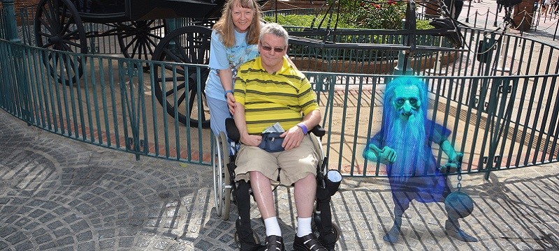 Neil and Brenda with haunted house ghost.