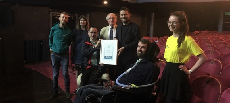 Photo of the award being received at The Lyceum.