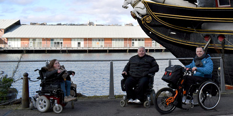 Photo of Claire, Gary and Ryan beside HMS Unicorn.