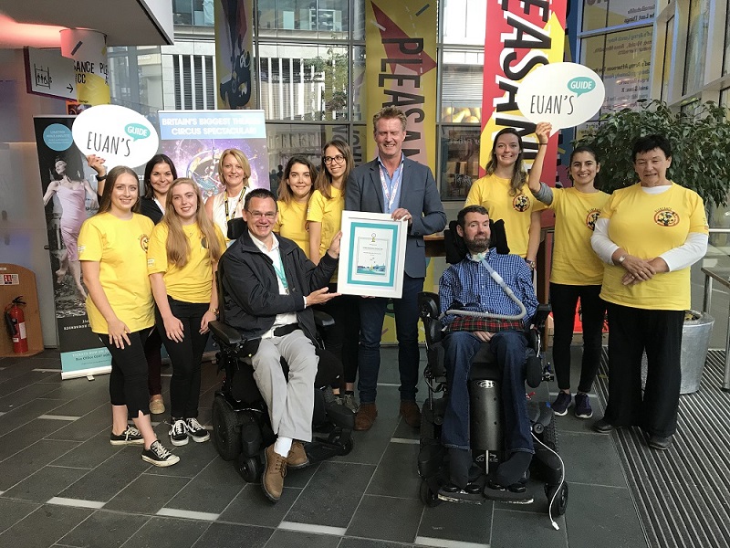 Photo of Euan and Paul with EICC team members.