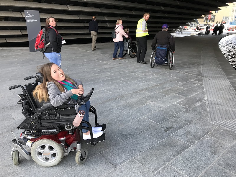 Photo of Claire outside the V&A Dundee.