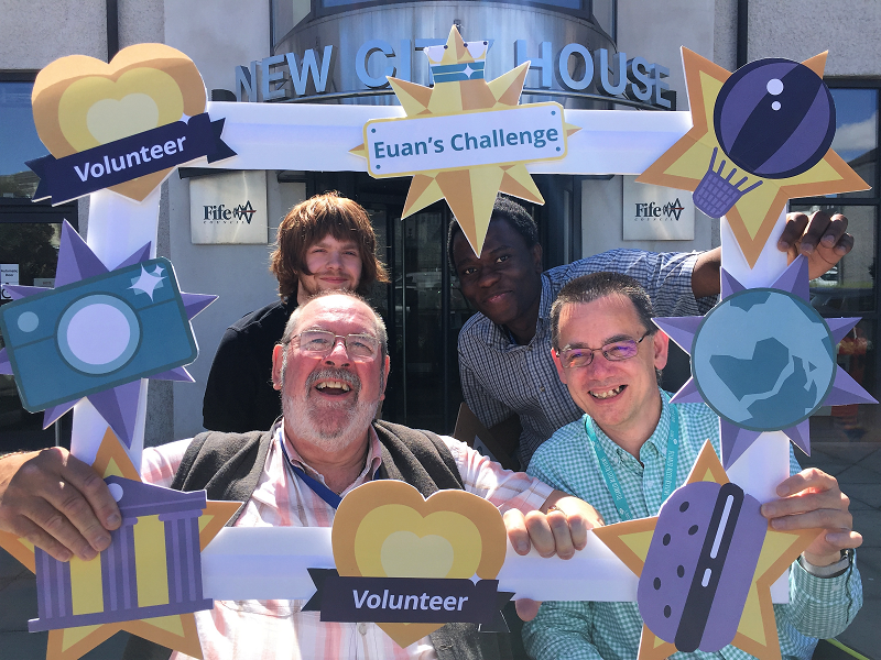 Photo of Dave inside a Euan's Guide photo prop frame.