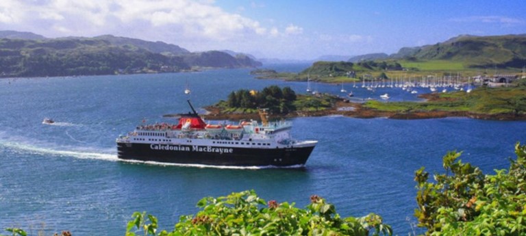 Photo of a CalMac ferry entering port.