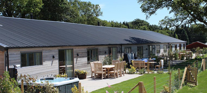 Photo of Wallops Wood Cottages.