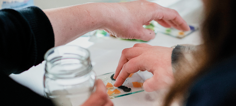 Image of hands working on crafts