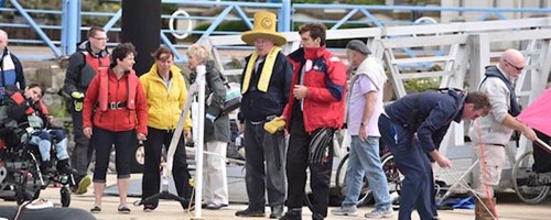 Photo of sailing spectators.