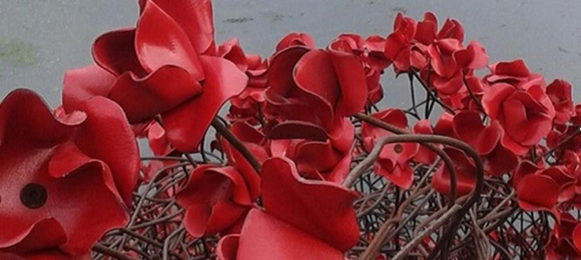 Photo of poppy sculpture.