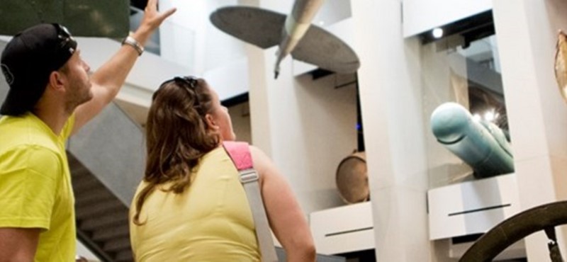 Photo of a family at a museum.