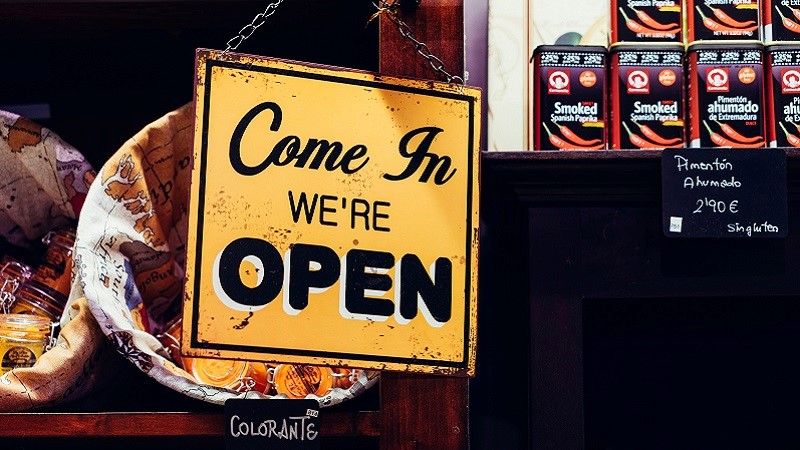 Photo of a shop open sign.