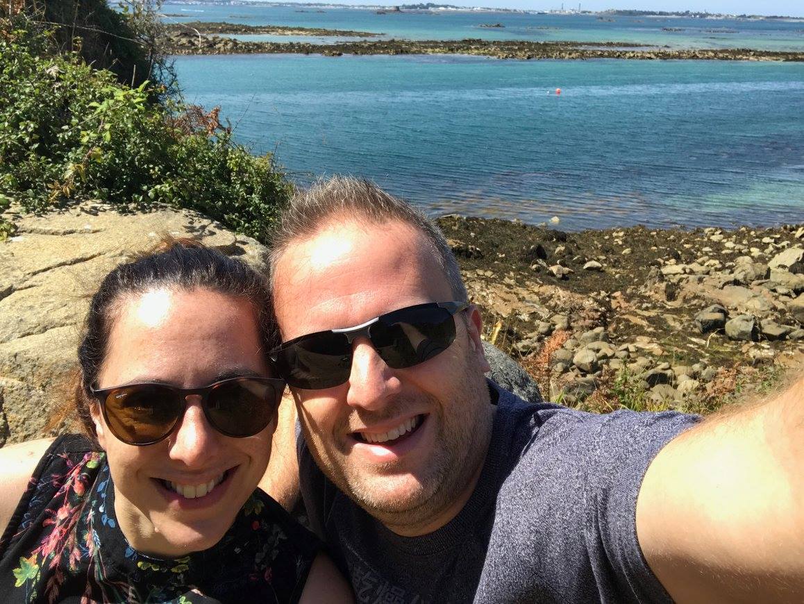 A selfie of Georgina and her husband Stuart with the sea behind them