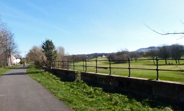 Looking south along the path, with Carrick Knowe Golf Course to the right.