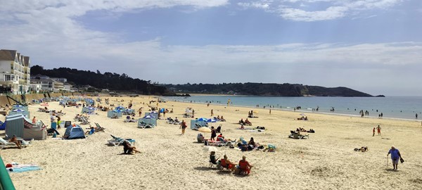 Ramp down to beach and firm sand at nearby St Brelade. Beachability hire beach wheelchairs here and there is a changing places accessible by radar key in the car park by the beach.