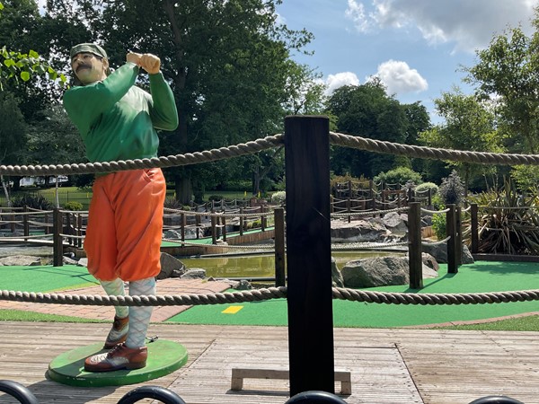 It’s a nicely laid out course, artificial green grass takes the holes over little waterfalls, and round and round you go, a lovely easy exercise course as well.