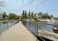 The walkway across the lake areas where we saw gigantic fish swimming in the water below