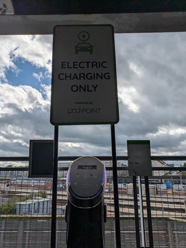 Image of the EV charger with signage