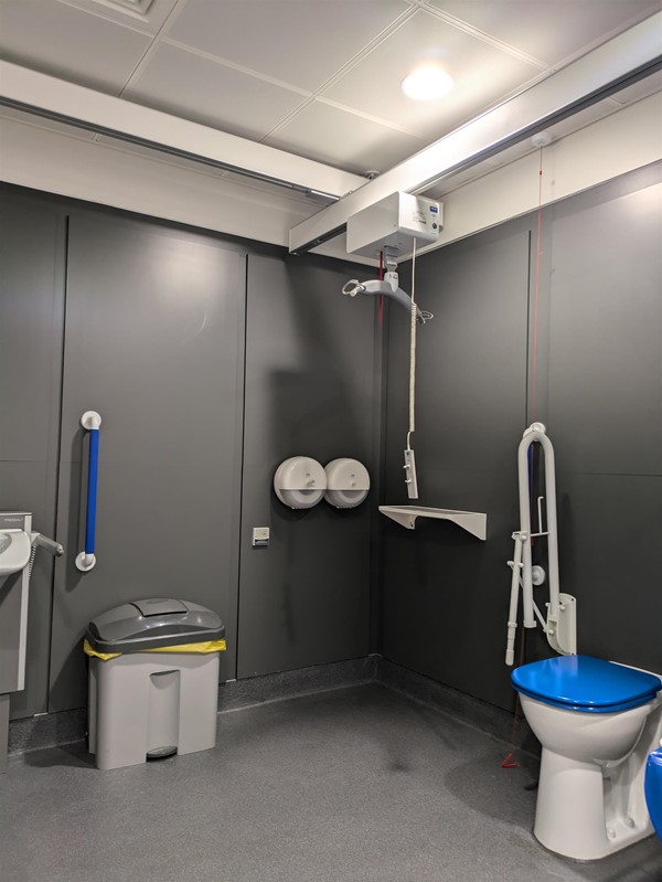 Image of  Changing Place toilet, ceiling track hoist and toilet with grab rails