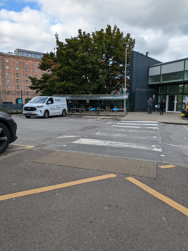 Image of zebra crossing outside of the station