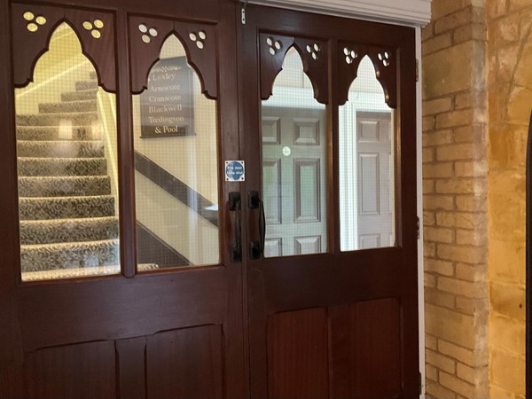 Image of a double doors with glass windows