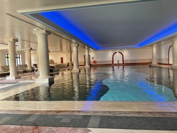 The most magnificent heated pool that beautifully lies in marbled stoned flooring