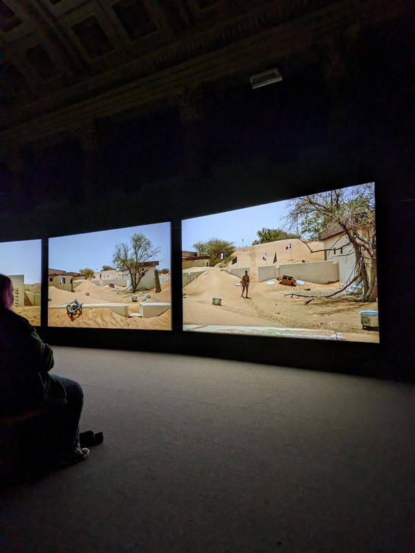 Image of screens showing the Mimesis: African Soldier film.