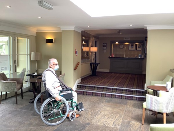 Photo 6,  reception desk, with steps. This also leads to disabled toilet and disabled room.