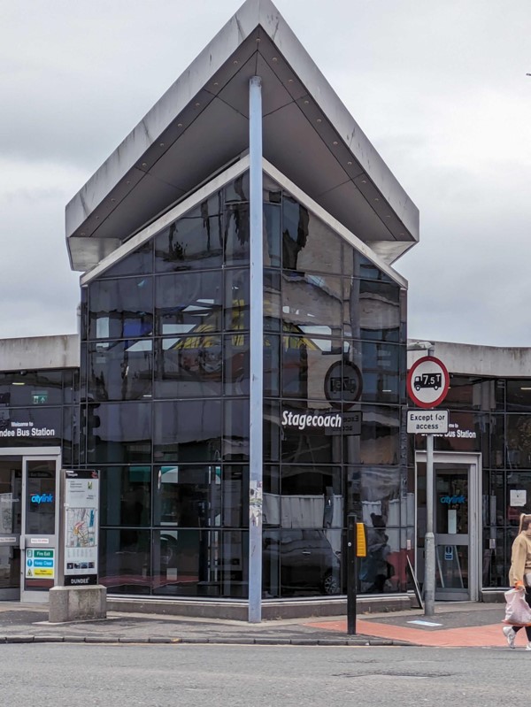 A building with a triangular shaped corner