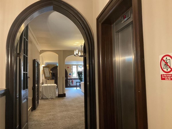 Image of a arched doorway in a hallway