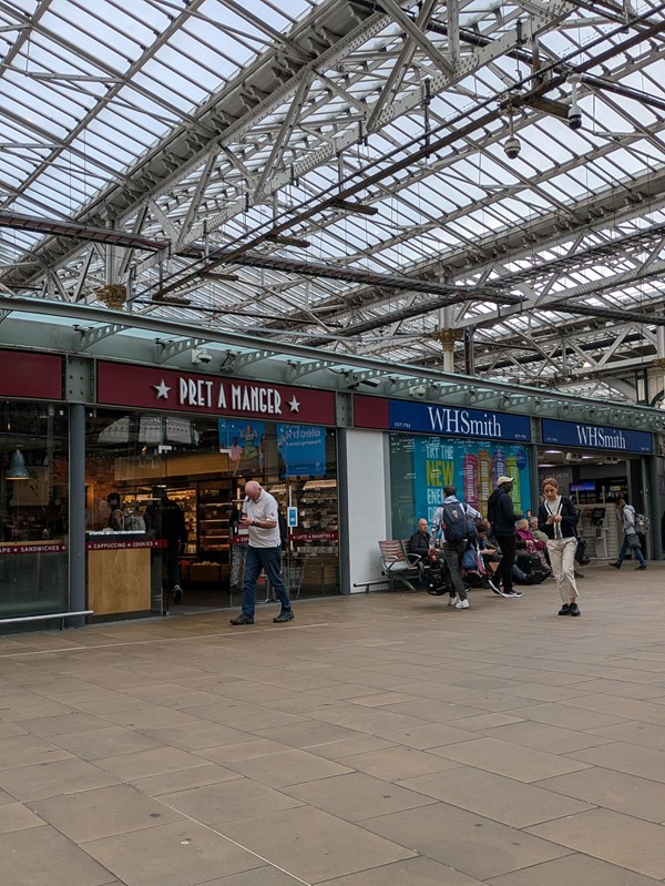 Image of the shop front of Pret A Manger and WH Smith