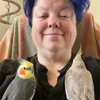 Lisa and our 2 cockatiels