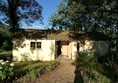 Cabin with gravel path