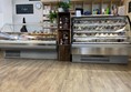 Image of cakes on display at a bakery