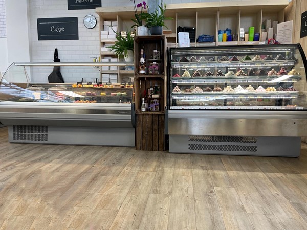 Image of cakes on display at a bakery