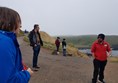 National Trust guide telling local stories on the road down to the rocks of the Giant's Causeway