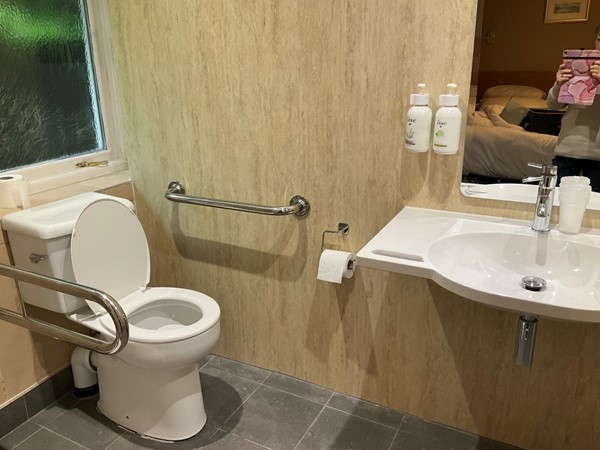 Another shot of bathroom.  The washbasin was a good height and had grips to help getting up.