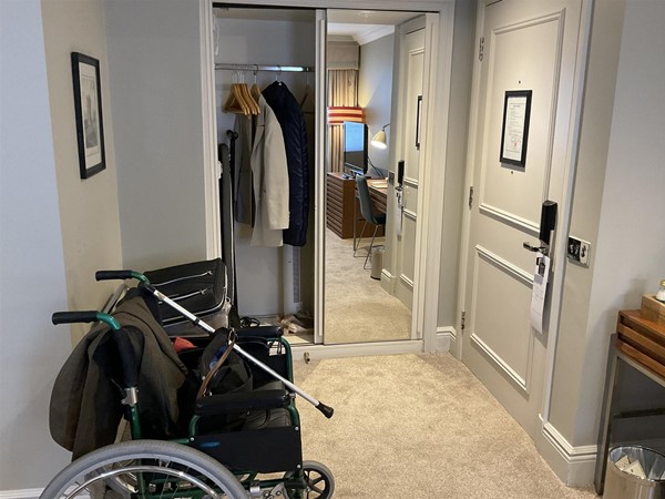 Image of a wheelchair in a hallway