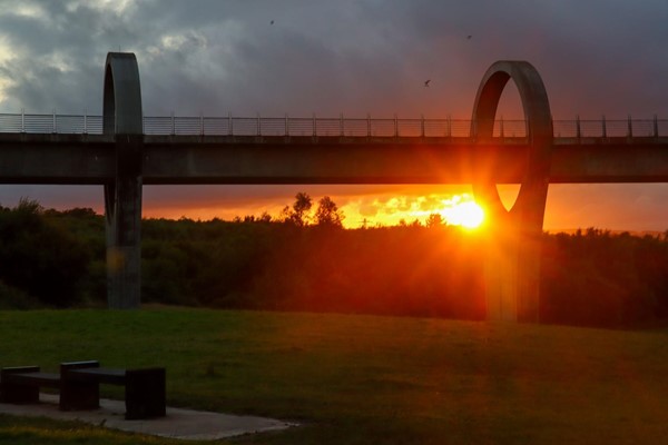 Beautiful red sunset through the wheel.