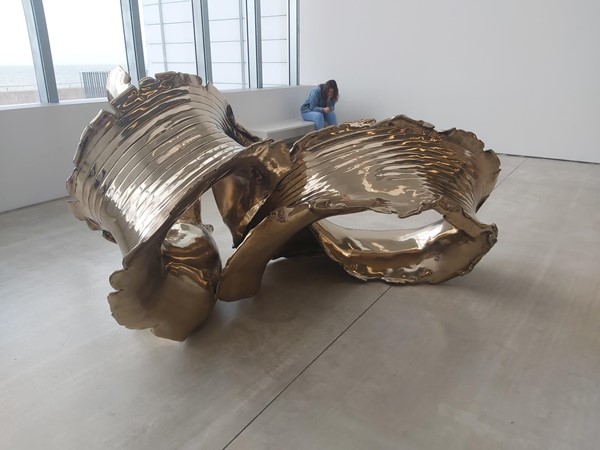 Image of a gold sculpture in a room