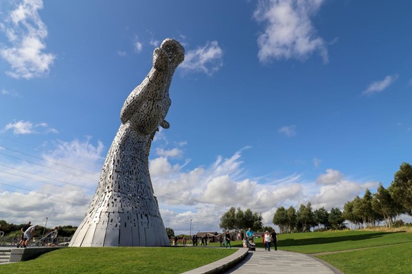 One of the Kelpies with a slow ramped path going up to it.