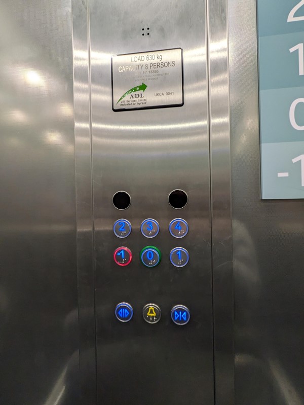 Image of the Braille marked buttons in the lift