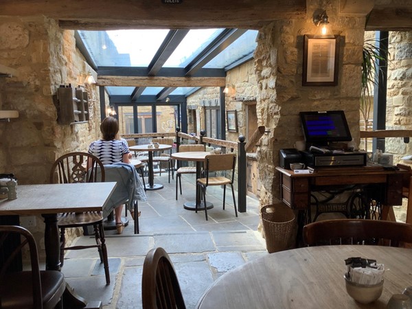 Exposed stone and quarry slabs in the tea room at BANTAM TEA ROOMS