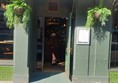 Picture of the door entrance to Gracie's