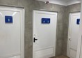 image of doors too toilets, including the accessible toilet