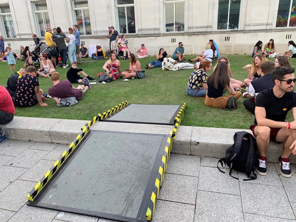 Ramps onto grassy areas for wheelchair users.