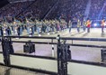 Image of a pipe band on a stage