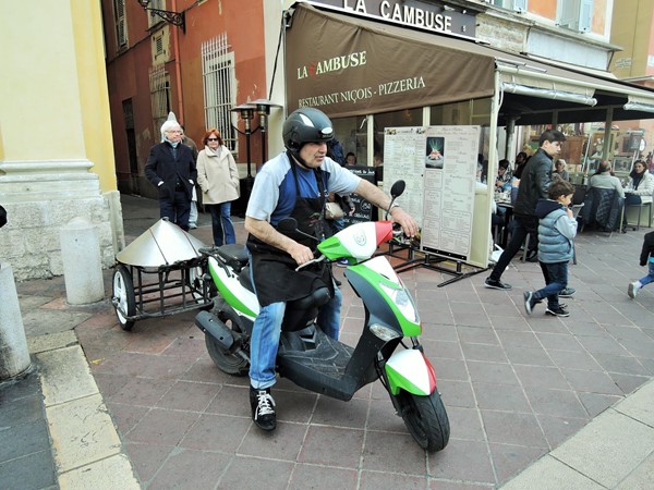 Socca arriving on moterbike to Chez Theresa Cours Saleya