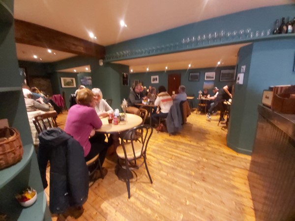 Image of a group of people sitting at tables