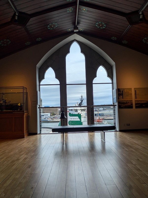 Image of large bay windows overlooking the harbour