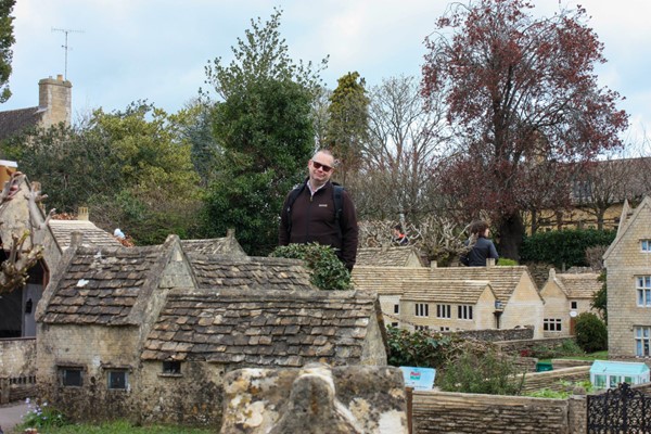Model village with man for scale