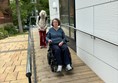 Image of a wheelchair user on a ramp