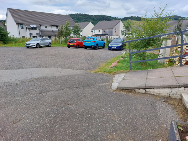 Image of a car park and a ramp